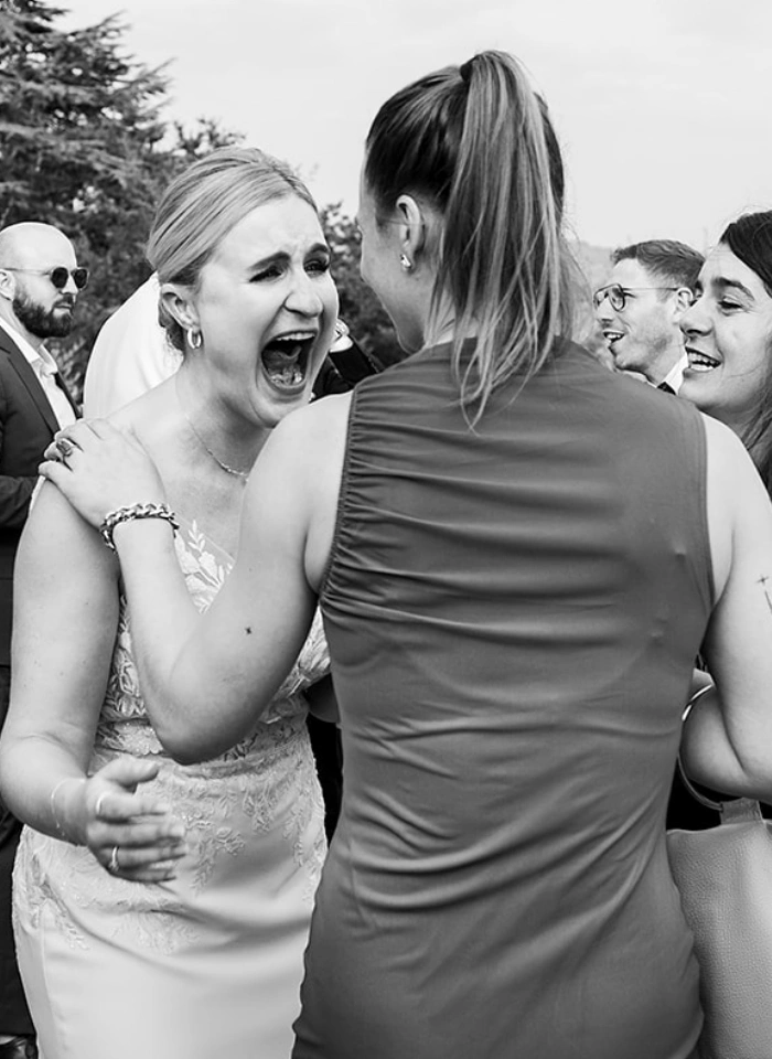 Bride yelling of excitement and happiness on her wedding day