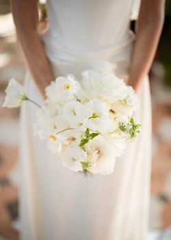 Close up of airy and delicate white bridal bouquet