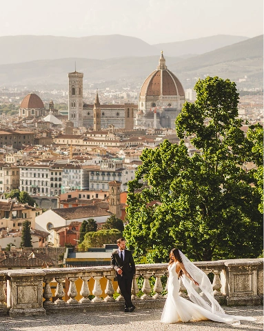 Bride and groom renew their vows overlooking Florence, Tuscany