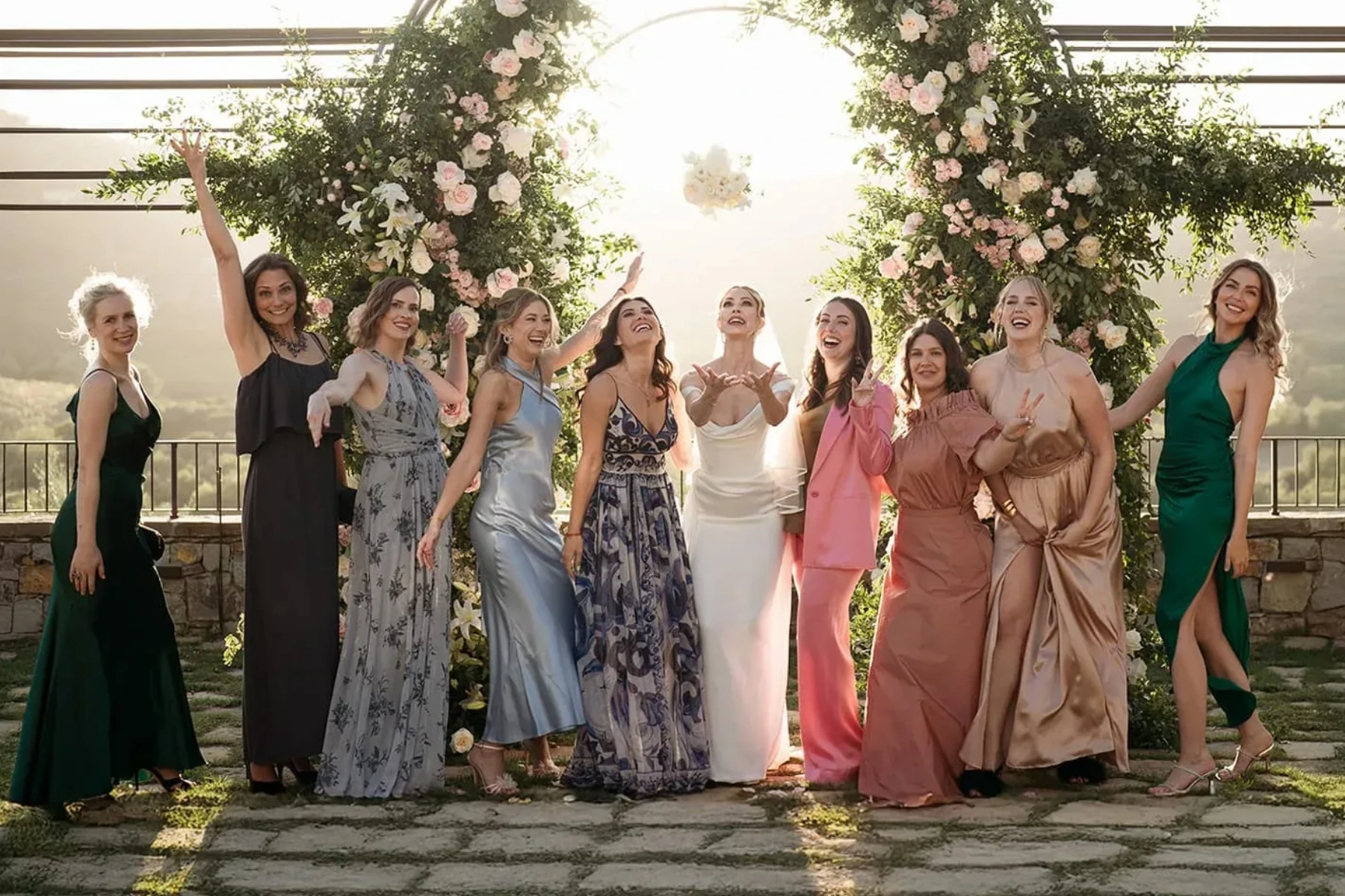 bride-bridesmaids-bouquet-toss