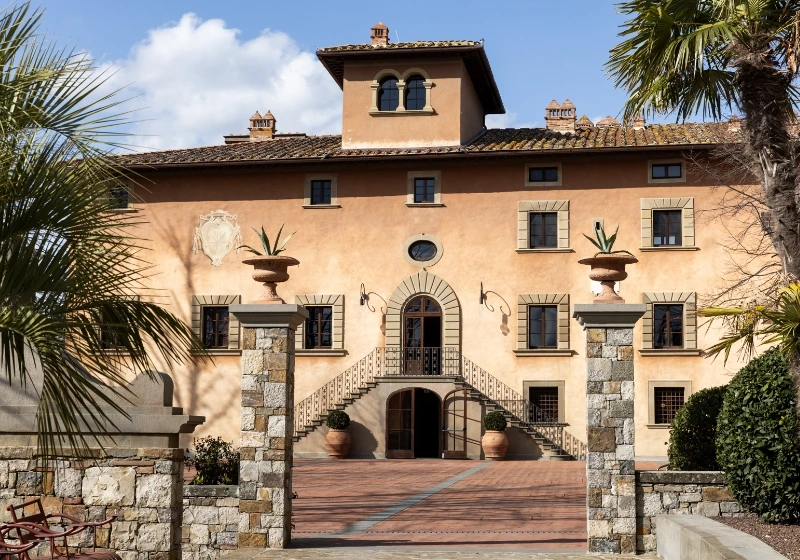 Il Borgo di Vignamaggio's facade with gate and staircase