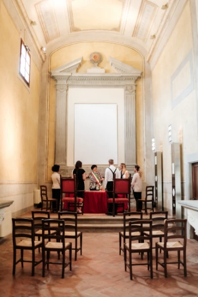 Civil wedding ceremony celebrated in town hall in Tuscany, Italy