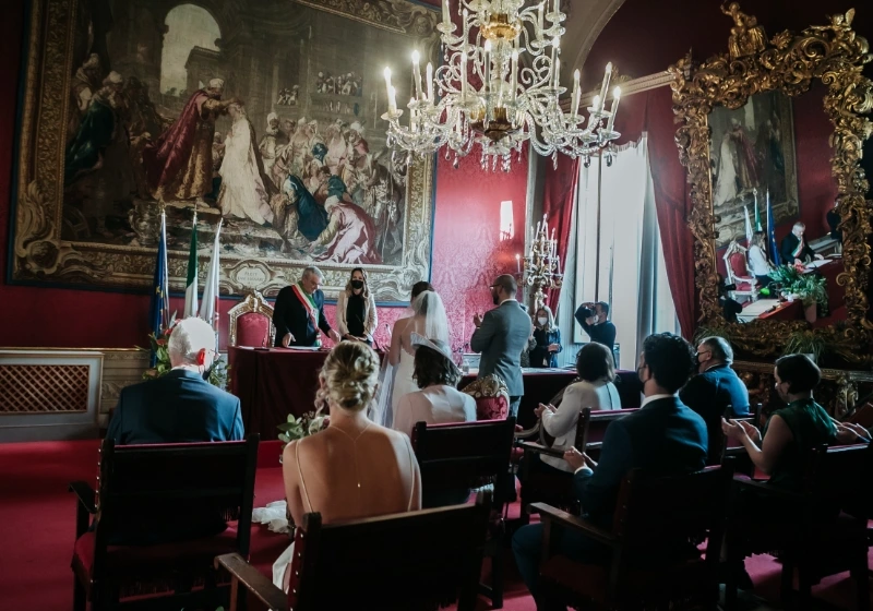 UK citizens getting legally married in Italy during civil ceremony in red room