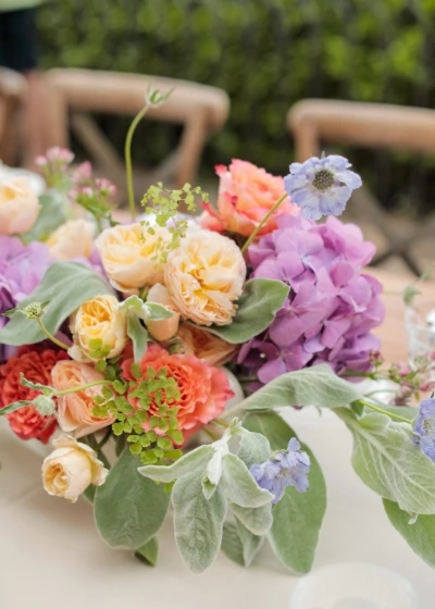 Detail shot of colorful wedding centerpiece with Spring colors