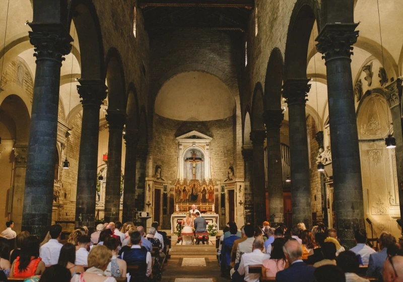 Groom and bride getting married in church in Italy during protestant wedding ceremony