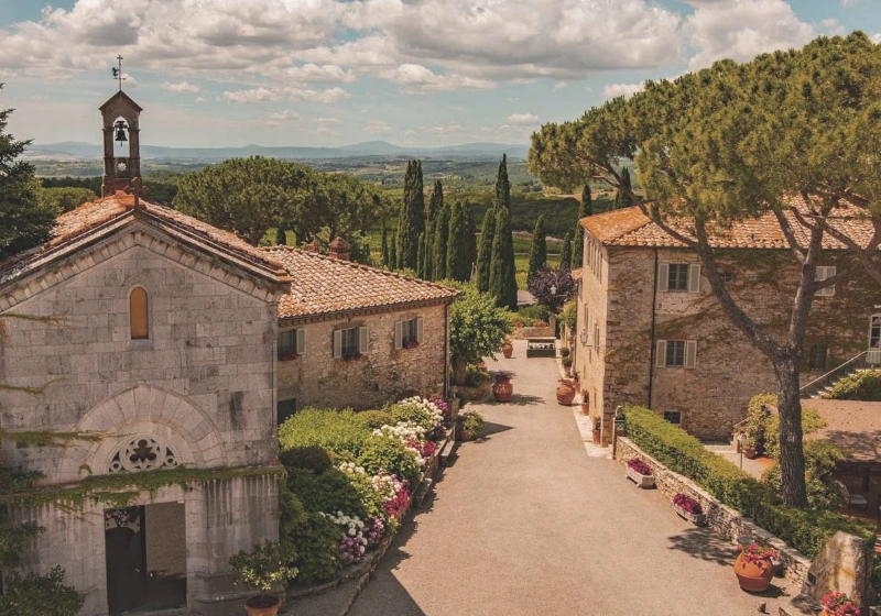 Aerial picture of Borgo San Felice near Siena: the church and the entrance alley.