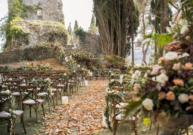 Wedding ceremony at the ruins of Castiglion del Bosco, a medieval tower overlooking the Tuscan countryside.