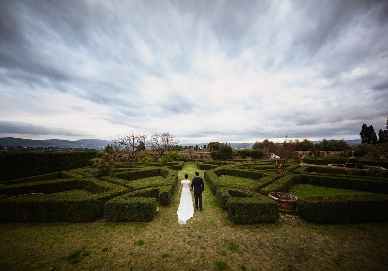 Photo of bride and groom in the garden in a day of winter season for their wedding 