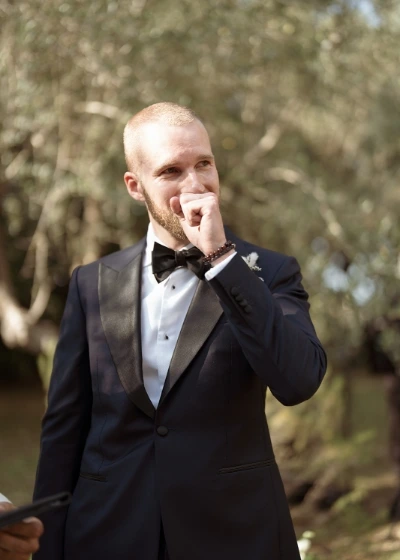 Photo of a groom waiting for the bride at the altar