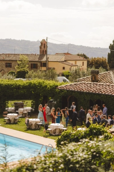 Vertical photo of many guest attending a wedding reception