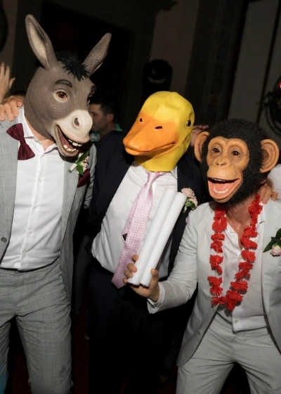 Guests enjoying the wedding party with animals masks