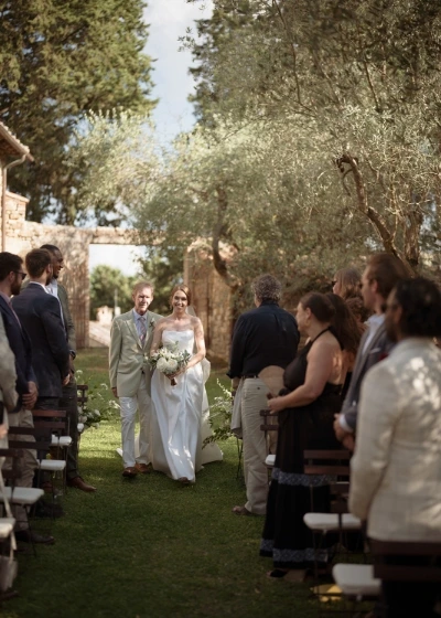 Photo of a bride walking dow the aisle 