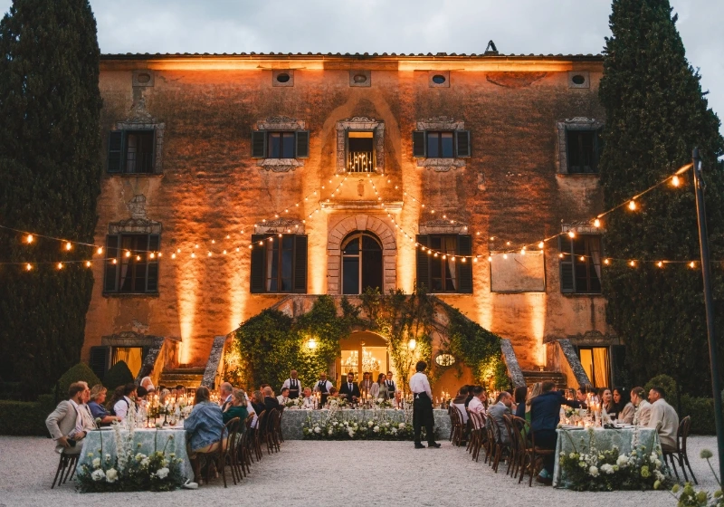 Wedding dinner in front of the facade of the villa