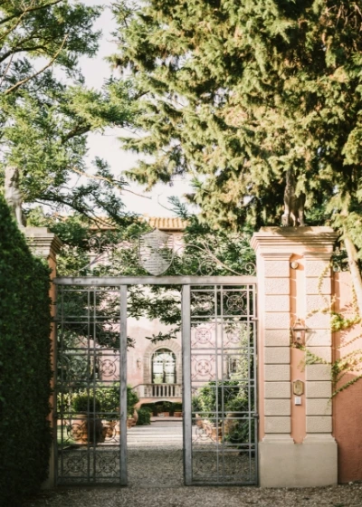 Elegant entrance gate of Villa Mangiacane in Tuscany