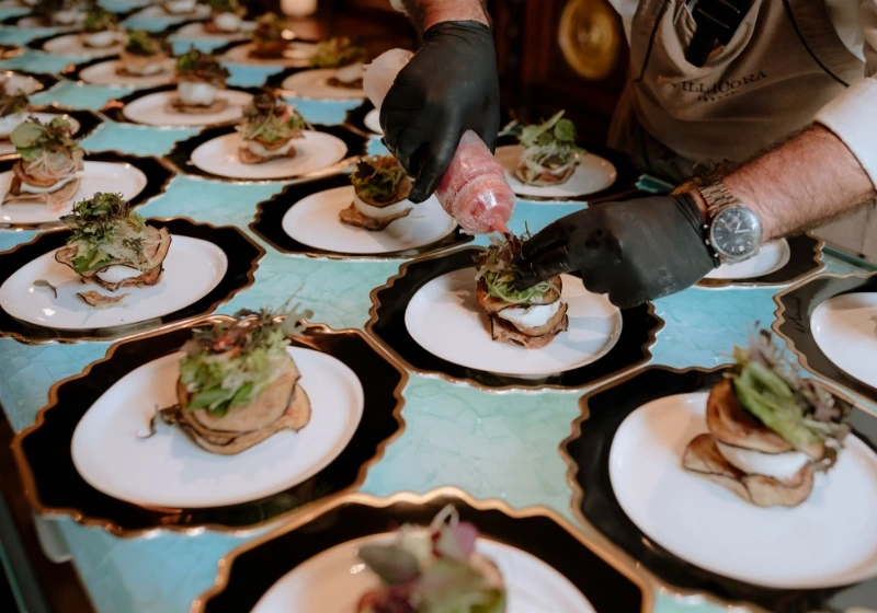 Professional chef preparing gourmet appetizers for wedding catering