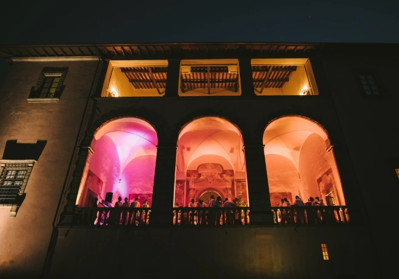 Wedding party in the elegant loggia of Villa Mangiacane