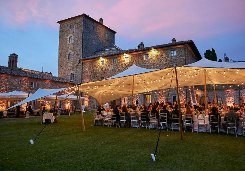 reception outdoor with a stetch tent at Borgo Scopeto