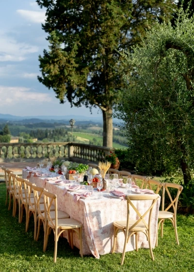 Outdoor multi-day wedding setup at a Tuscan venue fro the welcome dinner